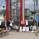 People visit a makeshift memorial for Tyre Sampson outside the Orlando Free Fall ride at the ICON Park entertainment complex, Wednesday, April 20, 2022, in Orlando, Fla. Sampson, a teenager visiting from Missouri on spring break, fell to his death while on the ride.
